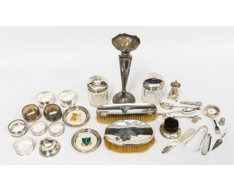 A collection of 19th &amp; 20th Century silver to include: eight silver napkin rings, two silver mounted toilet ink bottles, 