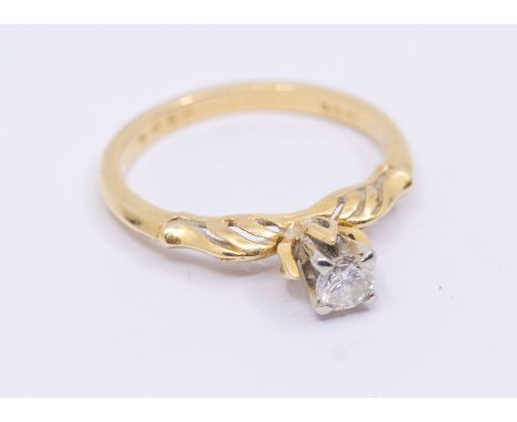 A  diamond and 18ct gold ring, comprising a round claw set brilliant diamond approx 0.20ct, to an ornate  high setting with w