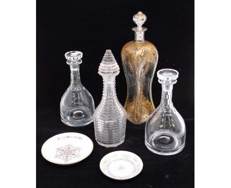 A late 19th Century gluck style decanter decorated with gilt scrolls together with a pair of 19th Century bell decanters, mus