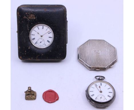 Two early 20th century silver open faced pocket watches one key wind within leather bound frame/ case, along with a silver co