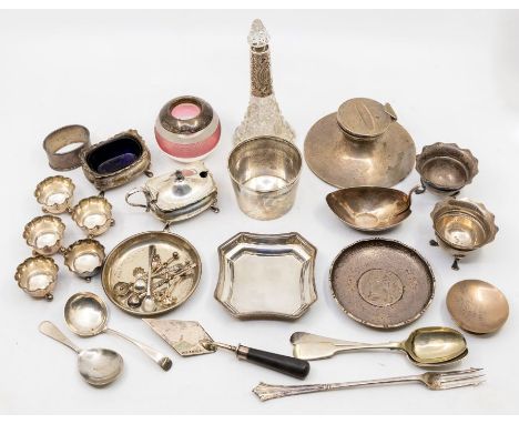 A collection of hallmarked silver items to include; A Capstan inkwell with hinged lid hallmarked for Birmingham 1909 by A and