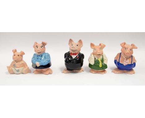 A set of five Wade ceramic NatWest piggy banks.
