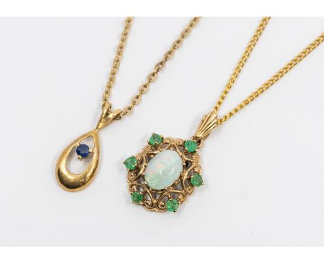 Two 9ct gold stone set pendants including an opal and emerald wire work pendant set to the centre with an oval opal within a 