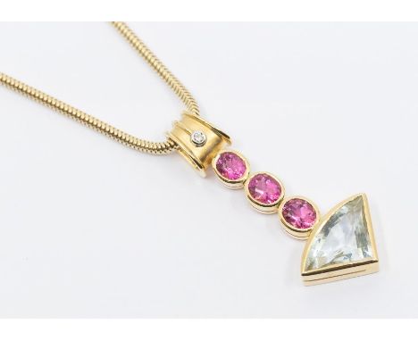An aquamarine and pink tourmaline diamond set 18ct gold pendant, comprising a triangular mixed cut aquamarine approx 18 x 12m