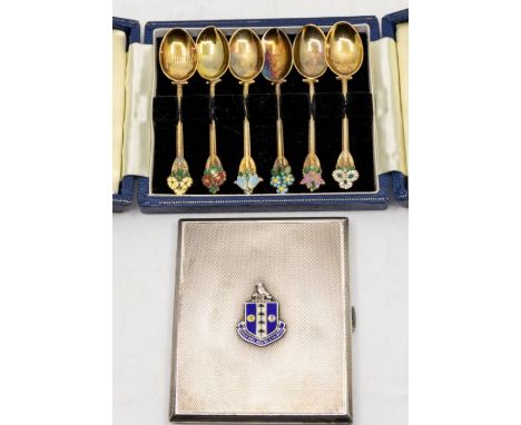 A Modern matched set of six silver gilt and enamel teaspoons, each terminal decorated with various coloured enamel flowers, h