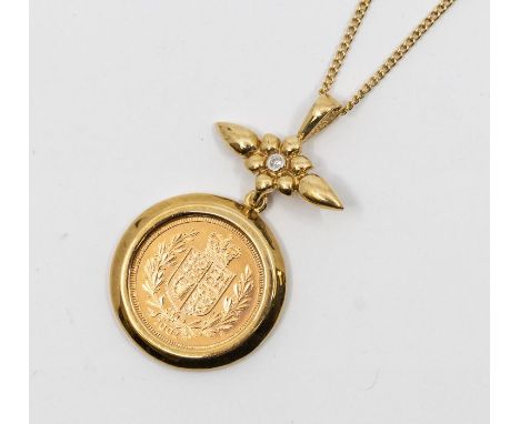 A Jubilee flower  half sovereign mounted in 9ct gold, the flower top set to the centre with round brilliant cut diamond, on a