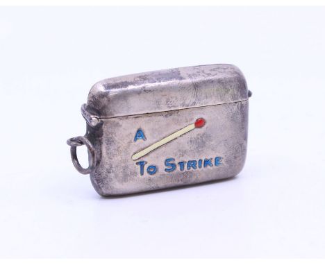 An early 20th Century silver plate and enamel novelty vesta case, on suspension ring, the cover blue lettering reads: A .... 