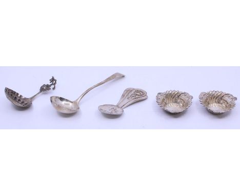 A collection of silver to include: George III Old English sauce ladle, engraved with initials, hallmarked by TN/GB, London, 1