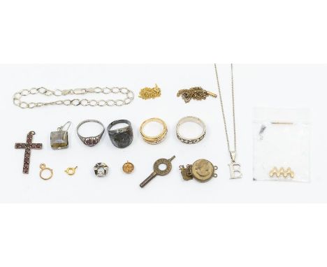 A small collection of jewellery to include: A 925 marked small curb bracelet (4.3grams); A 925 silver letter 'E' on a silver 