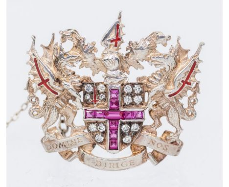 A silver city of London brooch by Toye, Kenning & Spencer, depicting London Coat of Arms, the central flag cross set with syn