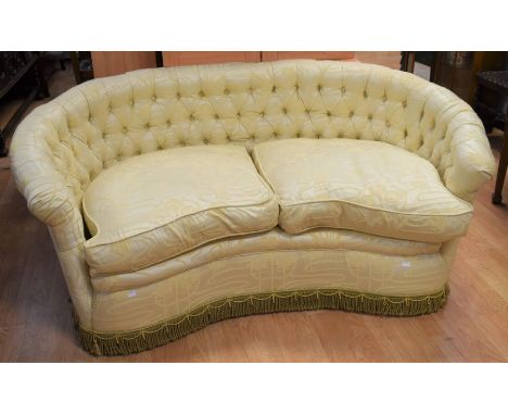 1920s kidney-shaped button-back two-seater Sofa with traditional horse hair stuffing.