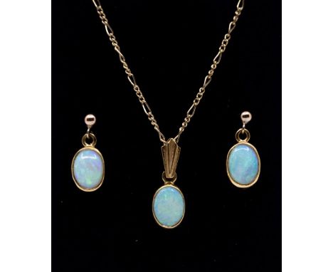 An opal and 9ct gold pendant and earrings set, comprising a pendant rub over set with an oval opal with green play of colour,