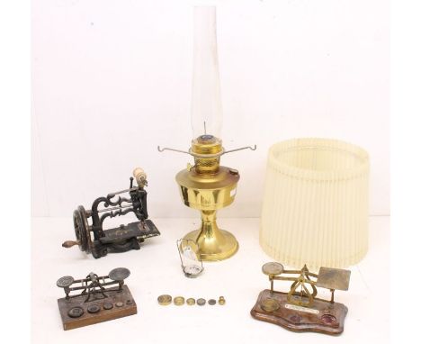 A small collection of metal items to include; A James Weir small cast iron sewing machine with painted and gilt decoration, A