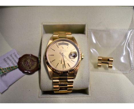 Rolex Oyster Perpetual Day-Date 36 in 18ct Gold Watch, with champagne-colour dial, fluted bezel and a president bracelet (two