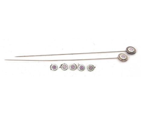 Two Art Deco silver and enamel hat pins and five matching dress buttons with purple guilloche enamelled detail with green sur