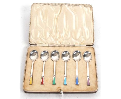 Cased set of six Art Deco silver and enamel teaspoons with multi-coloured coffin shaped enamel terminals, hallmarked for Shef