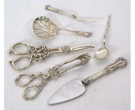 Mixed Lot: A pair of sterling stamped grape shears, sugar tongs and sifter ladle, a 925 marked teaspoon, a sterling lobster p