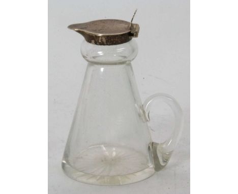 A George VI silver whisky noggin having silver flip top lid and mounted pourer, plain glass body and handle with a star cut b