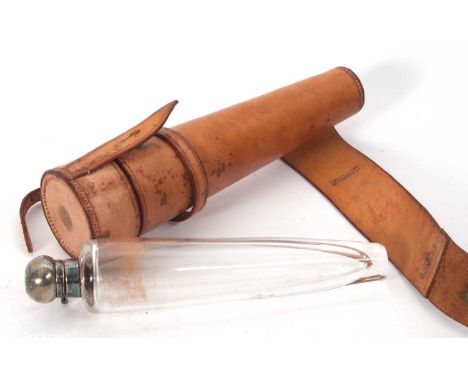 An antique glass riding flask with leather case, the conical glass flask with silver plated lancet fitted top in a tan colour