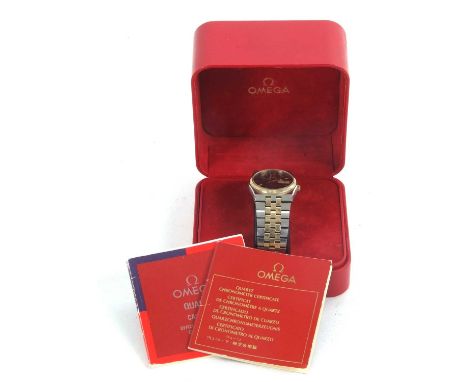 An Omega Constellation quartz gents wristwatch, the watch has a stainless steel case and two tone plated bracelet, it has a q