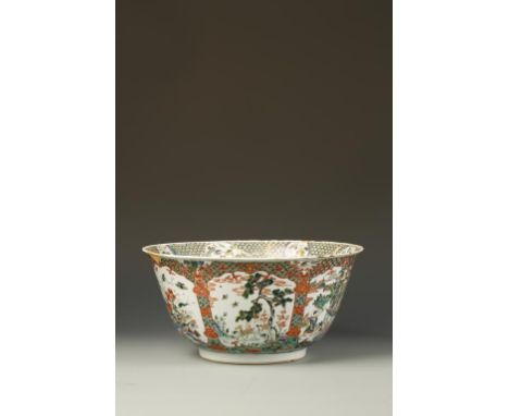 A LARGE CHINESE FAMILLE VERTE DEEP BOWL, the interior decorated with phoenix amongst flowers with a diaper panelled border ab