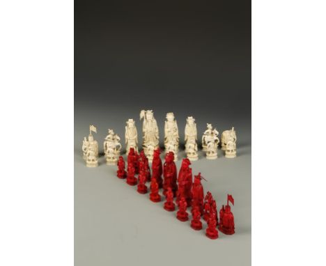 A CHINESE CANTON IVORY CHESS SET, the principal figures with intricate carving, the kings and queens modelled as Chinese empe