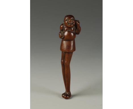 A JAPANESE WOOD ASHINAGA NETSUKE, the figure turning slightly to the left and with an expressive and one arm raised, unsigned