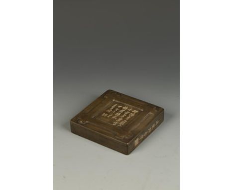 A CHINESE INSCRIBED SQUARE INKSTONE, the top surface with a poetic inscription signed Wu Changshuo and dated November 1914, s