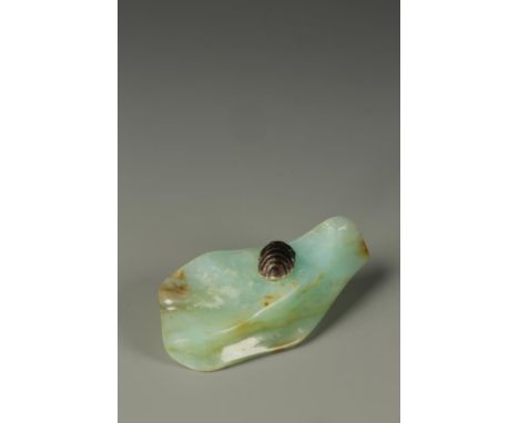 AN ANDEAN OPAL NATURALISTIC NETSUKE by Guy Shaw (1951- 2003), the stone carved as an irregular structure leaving a small area