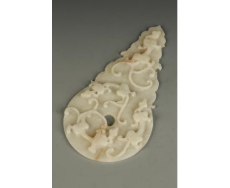 A CHINESE CELADON JADE ARCHAISTIC BI DISC of circular form with a shaped pointed top, the upper surface carved with four chil
