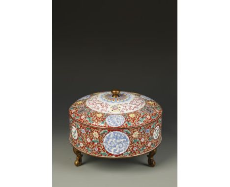 A CHINESE CANTON ENAMEL CYLINDRICAL SWEETMEAT DISH, the cover with a gilt finial and central flower motif within a border of 
