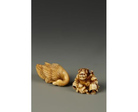 TWO JAPANESE IVORY NETSUKE, one of a seated Shoki with a demon, late 19th century, 1.5" long; the other of a goose with its' 