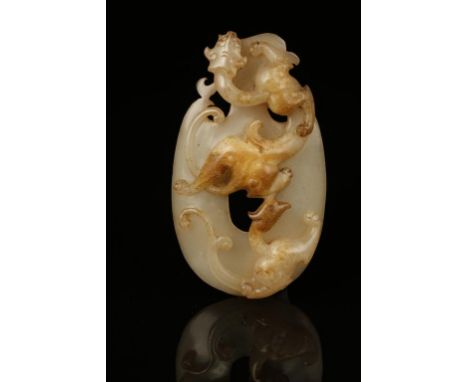 A CHINESE YELLOWISH JADE 'DRAGON AND PHOENIX' PENDANT of oval gently concave form with a phoenix-head top, the front carved i