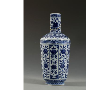 A FINE CHINESE BLUE AND WHITE BOTTLE VASE, the slightly tapering body with Persian-inspired decoration arranged in vertical p