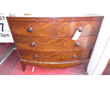 A Victorian mahogany bowfronted chest of two short over two long graduated drawers raised on splayed bracket supports  