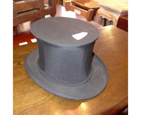 A vintage collapsible top hat 