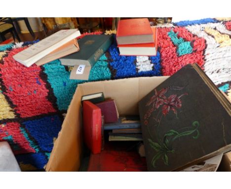A collection of vintage books and postcards 