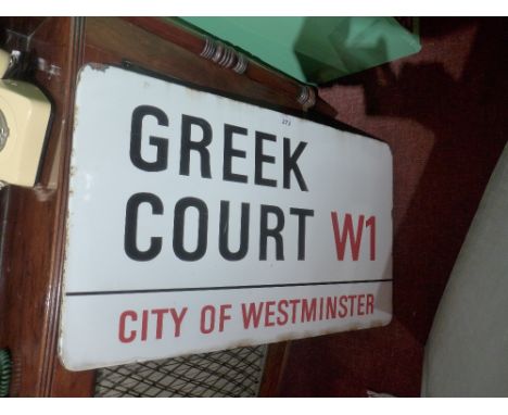A vintage enamelled street sign for Greek Court W1 city of Westminster 