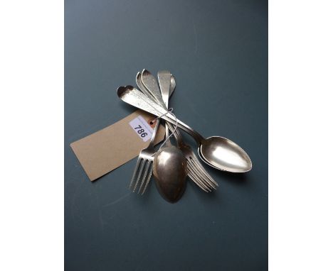 A collection of French silver including knives, spoons and a cup and saucer 