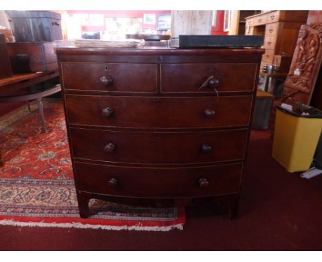 A mahogany bowfronted chest with two over three long drawers raised on bracket feet, 100cm wide 