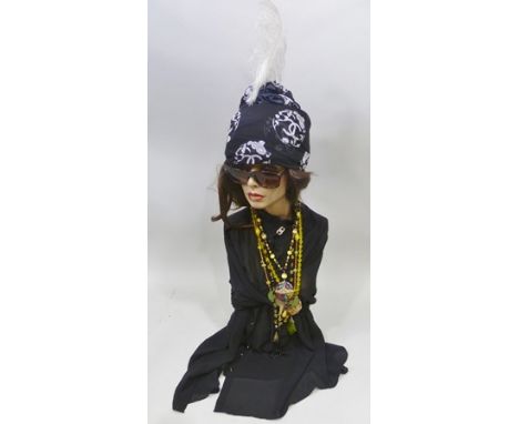 FOUR VINTAGE NECKLACES draped on a part mannequin with additional brooch, and other accessories 