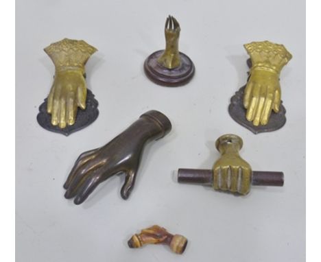TWO LATE VICTORIAN HAND DESIGN METAL PAPER CLIPS, other METAL HANDS, and a carved clutched hand PIPE BOWL 