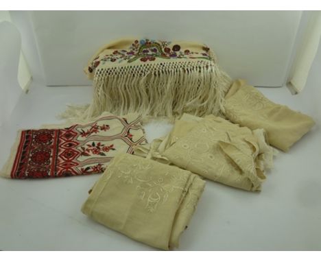 AN EMBROIDERED INDIAN SILK SKIRT AND TOP other embroidered fabrics, a polychrome silk shawl with fringing and an Eastern Euro