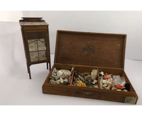 AN EDWARDIAN MAHOGANY DOLL'S DISPLAY CABINET raised on squared supports, 14cm wide, 34cm high, together with a COLLECTION OF 