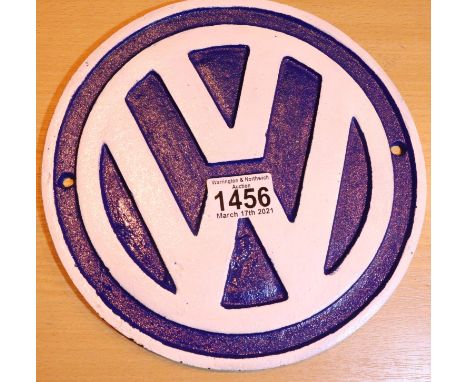 Cast iron circular VW sign, D: 25 cm. P&amp;P Group 2 (£18+VAT for the first lot and £3+VAT for subsequent lots) 