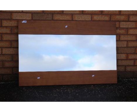 A vintage wall mirror, approximately 70 cm x 110 cm.