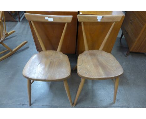 A pair of Ercol Blonde elm and beech chairs 