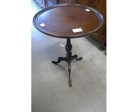 A mahogany tripod wine table 