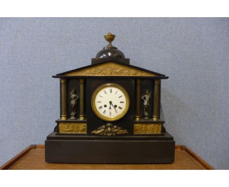 A 19th Century French Belge noir and gilt metal architectural cased mantel clock 
