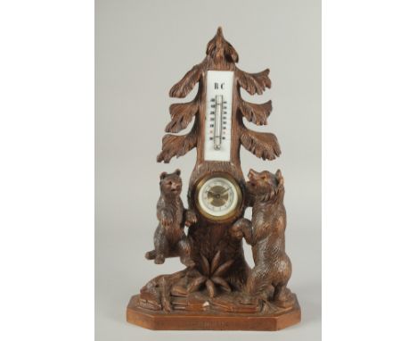 A GOOD CARVED BLACK FOREST CLOCK AND THERMOMETER carved with two bears. 5ins high.